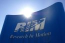 BlackBerry maker RIM reports loss for latest quarter, announces changes and plans