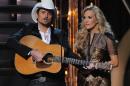 Hosts Carrie Underwood and Brad Paisley onstage at The 47th Annual CMA Awards, on Wednesday, November 6, 2013 at Bridgestone Arena in Nashville, Tenn. (Photo by Frank Micelotta/Invision/AP Images)
