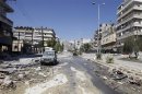 An empty street is pictured in Salah al- Din neighborhood following clashes between the Free Syrian Army fighters and Syrian Army soldiers in central Aleppo