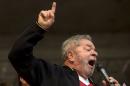 Brazil's former President Luiz Inacio Lula da Silva delivers a speech during a May Day rally in Sao Paulo, Brazil, Friday, May 1, 2015. Left-wing groups, governments and trade unions were staging rallies around the world Friday to mark International Workers Day, also known as May Day. (AP Photo/Andre Penner)