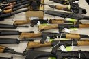 This Tuesday, Jan. 25, 2011 picture shows part of a cache of seized weapons displayed at a news conference in Phoenix. The ATF is under fire over a Phoenix-based gun-trafficking investigation called 