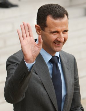 Assad applauds fall of Egypt's Muslim Brotherhood 1e43fa442f9b4517370f6a706700a449