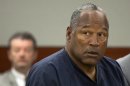 FILE - In this May 16, 2013 file photo, O.J. Simpson listens during an evidentiary hearing in Clark County District Court, Thursday, May 16, 2013 in Las Vegas. O.J. Simpson won a small victory Wednesday. July 31, 2013, in his bid for freedom as Nevada granted him parole on some of his convictions in a 2008 kidnapping and armed robbery involving the holdup of two sports memorabilia dealers at a Las Vegas hotel room. (AP Photo/Julie Jacobson, Pool, File)