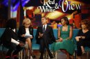U.S. President Barack Obama and first lady Michelle Obama take part in a taping of the "The View" chat show at ABC's studios in New York