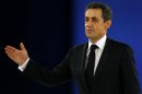 France's President and candidate for the upcoming election, Nicolas Sarkozy waves after his speech during a meeting in Villepinte, north of Paris, France, as part of his electoral campaign, Sunday March 11, 2012. (AP Photo/Francois Mori)