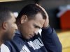 New York Yankees' Alex Rodriguez watches from the bench during Game 4 of the American League championship series against the Detroit Tigers Thursday, Oct. 18, 2012, in Detroit. (AP Photo/Paul Sancya )