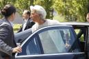 Managing Director of the International Monetary Fund Christine Lagarde, center, arrives for a meeting of eurozone finance ministers at the EU Lex building in Brussels on Saturday, July 11, 2015. Greece's negotiators head to Brussels on Saturday armed with their reform proposals and parliamentary backing to seek a third bailout, but with the shadow of severe dissent from governing lawmakers hanging over them. (AP Photo/Francois Walschaerts)