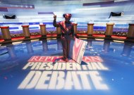 Dennis Size, of The Lighting Design Group, works on the stage at CY Stephens Auditorium in Ames, Iowa, Wednesday, Aug. 10, 2011, as crews setup up for Thursday's Iowa GOP/Fox News Debate. (AP Photo/Charlie Neibergall)