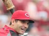 Cincinnati Reds' Joey Votto smiles during batting practice before an exhibition baseball against the Reds Futures minor league team, Tuesday, April. 3, 2012 in Cincinnati.  (AP Photo/Tony Tribble)