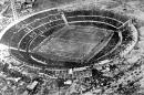 FILE - In this July 30, 1930 file photo, an aerial view of the Centenario stadium in Montevideo, Uruguay. Uruguay defeated Argentina 4-2 in the World Cup soccer final match. On this day: July 13, 1930 saw the first ever World Cup matches played. France defeated Mexico 4-1, while the US beat Belgium 3-0 at smaller stadiums, in Montevideo. (AP Photo/File)
