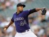 Juan Nicasio of the Colorado Rockies pitches against the Washington Nationals