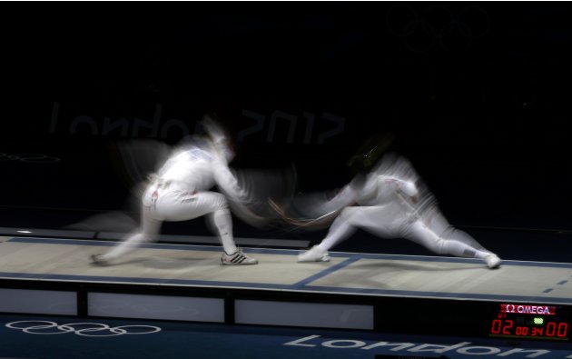 Germany's Heidemann competes against South Korea's Shin during their women's epee individual semifinal fencing competition at the ExCel venue at the London 2012 Olympic Games