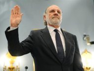 Corzine is sworn in to testify about the firm's bankruptcy during a hearing before the U.S. House Agriculture Committee on Capitol Hill in Washington