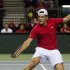 Canada's Frank Dancevic hits a return to Spain's Marcel Granollers during the first round of the Davis Cup tennis tie in Vancouver
