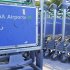 BAA logos are seen on luggage trollies at Heathrow Airport in west London