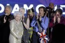 FILE - In this Monday, June 4, 2012 file photo, Britain's Queen Elizabeth II, 2nd from left, is joined on stage by performers Sir Tom Jones, Annie Lennox, Sir Paul McCartney and Sir Elton John at the conclusion of the Queen's Jubilee Concert in front of Buckingham Palace, London. McCartney turned 70 years of age Monday June 18, 2012. (AP Photo/Joel Ryan)