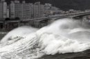 A wave is seen in Busan as Typhoon Bolaven batters South Korea