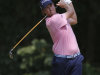Webb Simpson tees off on the fourth hole during the third round of the Wyndham Championship golf tournament in Greensboro, N.C., Saturday, Aug. 20, 2011. (AP Photo/Chuck Burton)