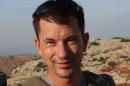British photojournalist John Cantlie, seen here, was kidnapped along with fellow journalist James Foley while covering the war in Syria in November 2012