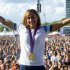 British track and field athlete Jessica Ennis wears her heptathlon gold medal while greeting fans at the BT London Live concert at Hyde Park in central London during the 2012 Summer Olympics, Sunday, Aug 5, 2012. (AP Photo/Joel Ryan)