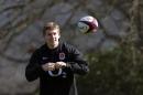 David Strettle prepares to catch the ball during a training session in Bagshot, south-east England, on March 15, 2012