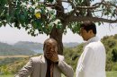 In this film image released by Paramount Pictures, Eddie Murphy, left, and Cliff Curtis are shown in a scene from 