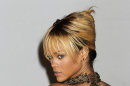 La cantante Rihanna llega a los Brit Awards 2012 en la Arena O2 en Londres el martes 21 de febrero de 2012. La colaboraciÃ³n musical de Rihanna y Crhis Brown a tres aÃ±os de que Ã©l la golpeara ha dejado a muchos preguntÃ¡ndose el juicio que tiene la cantante como modelo a seguir. (Foto AP /Jonathan Short)