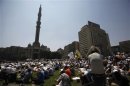 Members of the Muslim Brotherhood and supporters of ousted Egyptian President Mohamed Mursi attend Friday prayers at Ramses Square in Cairo
