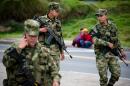 Soldiers patrol the Bogota-Tunja highway in Boyaca department, Colombia on April 28, 2014