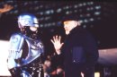 FILE - This 1990 file photo released by Orion Pictures Corp. shows film director Irvin Kershner, right, and actor Peter Weller, portraying Robocop, during the making of 