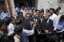 Tahir Naveed Chaudhry, lawyer for Rimsha Masih, a Christian girl accused of blasphemy, speaks to the media along with other lawyers after he appeared before a judge at the district court in Islamabad
