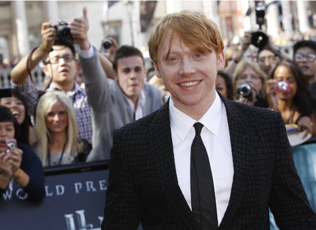 British actor Rupert Grint arrives in Trafalgar Square, in central London, for the World Premiere of Harry Potter and The Deathly Hallows: Part 2, the last film in the series, Thursday, July 7, 2011. 