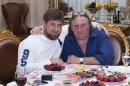 Actor Depardieu poses for a picture with Chechen President Kadyrov during a meeting at the presidential residence in Grozny
