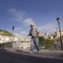 A man walks in Moratalla, a small agricultural center and rural tourism destination of just 8,500 people, in Spain, Thursday, Aug. 11, 2011. Moratalla, is one of the few towns in Spain that admits it's on the verge of going broke. None of the 120 municipal workers have been paid since June. (AP Photo/Alberto Saiz)