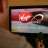 Virgin Media has unveiled a deal with music-streaming website Spotify that will allow its customers to listen to music via their phone, computer or TV