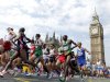 Athletes run near Big Ben during the men's marathon at the 2012 Summer Olympics, at the 2012 Summer Olympics, London, Sunday, Aug. 12, 2012. (AP Photo/Luca Bruno)