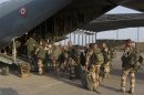 Handout photo of French troops boarding a transport plane in Ndjamena, Chad