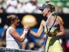 Maria Sharapova of Russia shakes hands with Kirsten Flipkens of Belgium after defeating her in their women's singles match at the Australian Open tennis tournament in Melbourne
