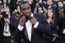 Musician Sean Combs arrives on the red carpet for the screening of the film Lawless at the 65th Cannes Film Festival