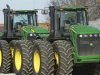 This Jan. 6, 2012 photo, shows John Deere farm tractors at Sloan's Implement John Deere Dealership, in Virden, Ill.  Deere & Co. said Wednesday, Feb. 15, 2012, strong equipment sales, especially outside the United States and Canada, helped its quarterly profit grow 4 percent and prompted an improved outlook for 2012. (AP Photo/Seth Perlman)