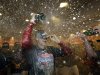 Philadelphia Phillies' Hunter Pence celebrates in the locker room after the Phillies defeated the St. Louis Cardinals, 9-2 in a baseball game to clinch the NL East title Saturday, Sept. 17, 2011, in Philadelphia. (AP Photo/Matt Slocum)