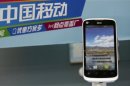 A ZTE phone is displayed at a mobile phone retail shop in Beijing