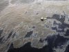 An aerial view shows oil that seeped from a well operated by Chevron at Frade, on the waters in Campos Basin in Rio de Janeiro state