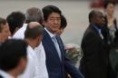 Japan's PM Abe, talks to Cuban authorities upon his arrival at the Jose Marti International Airport in Havana, Cuba