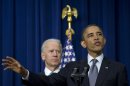 President Barack Obama, accompanied by Vice President Joe Biden, gestures as he talks about proposals to reduce gun violence, Wednesday, Jan. 16, 2013, in the South Court Auditorium at the White House in Washington. (AP Photo/Carolyn Kaster)