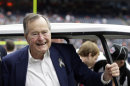 FILE - In this Nov. 4, 2012 file photo, former president George H.W. Bush pauses for a photo before an NFL football game in Houston between the Buffalo Bills and the Houston Texans. A spokesman said Monday, Jan. 14, 2013 that the 88-year-old Bush has left a Houston hospital where he spent nearly two months recovering from an illness that began with a bronchitis-related cough. (AP Photo/Eric Gay, File)