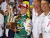 Kasey Kahne poses with the trophy in victory lane after winning the NASCAR Coca-Cola 600 Sprint Cup Series auto race in Concord, N.C., Sunday, May 27, 2012. (AP Photo/Chuck Burton)
