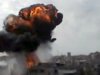 In this image made from amateur video released by the Shaam News Network and accessed Sunday, April 15, 2012, smoke billows an impact following purported shelling in Homs, Syria. Syrian troops are reported to have shelled residential neighborhoods dominated by rebels in the central city of Homs Sunday, activists said, killing at least three people hours before the first batch of United Nations observers were to arrive in Damascus to shore up a shaky truce. (AP Photo/Shaam News Network via AP video) TV OUT, THE ASSOCIATED PRESS CANNOT INDEPENDENTLY VERIFY THE CONTENT, DATE, LOCATION OR AUTHENTICITY OF THIS MATERIAL