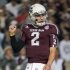 Texas A&M quarterback Johnny Manziel reacts after a touchdown run by teammate Ben Malena during the first quarter an NCAA college football game against Missouri, Saturday, Nov. 24, 2012, in College Station, Texas. (AP Photo/Dave Einsel)
