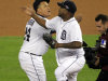 Detroit Tigers relief pitcher Jose Valverde, right, and teammate Miguel Cabrera celebrate after the last out in the ninth inning of Game 1 of the American League division baseball series against the Oakland Athletics, Saturday, Oct. 6, 2012, in Detroit. The Tigers won 3-1. (AP Photo/Carlos Osorio)